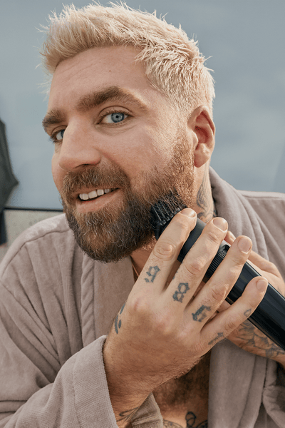 Man shaving his beard