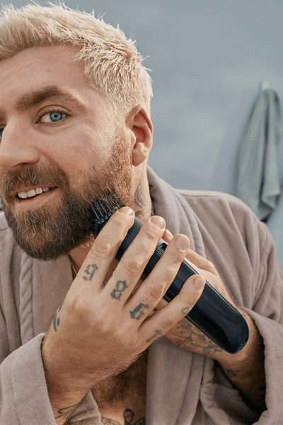 Man shaving his beard
