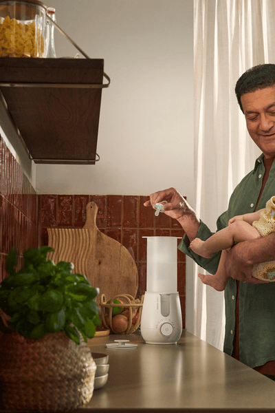 Progenitor(a) a utilizar o aquecedor e esterilizador 2 em 1 Premium