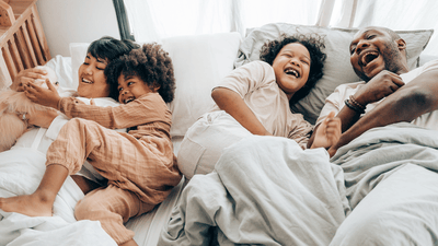 Family of four starting their day together