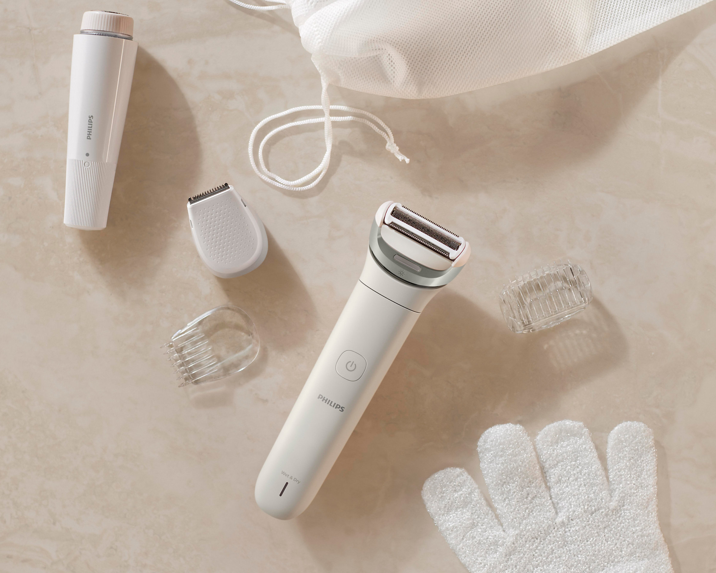 Philips lady shaver with trimmer, glove, and charger