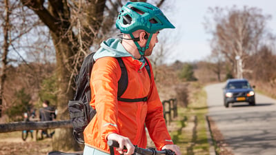 Athlete cycling using Philips headphones