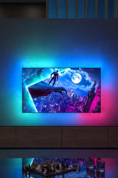 Philips OLED 950 TV showing city scene with Ambilight