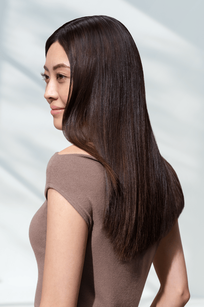 Sleek and glossy hair, styled with care