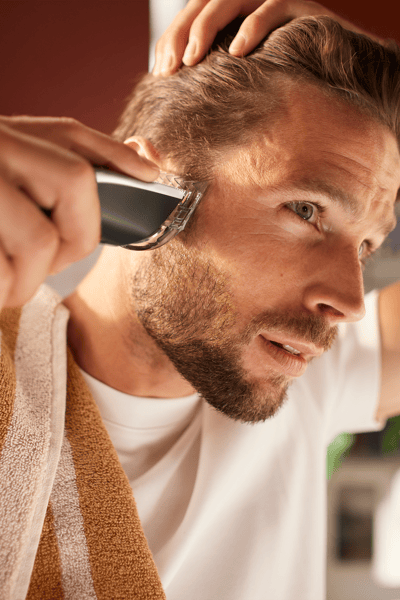 Man with a hair clipper