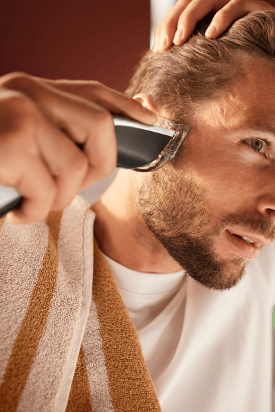 Man with a hair clipper