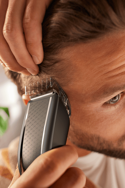 Man with a hair clipper