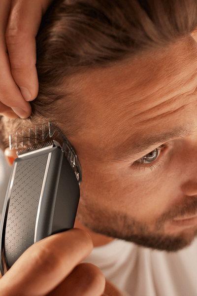 Man with a hair clipper