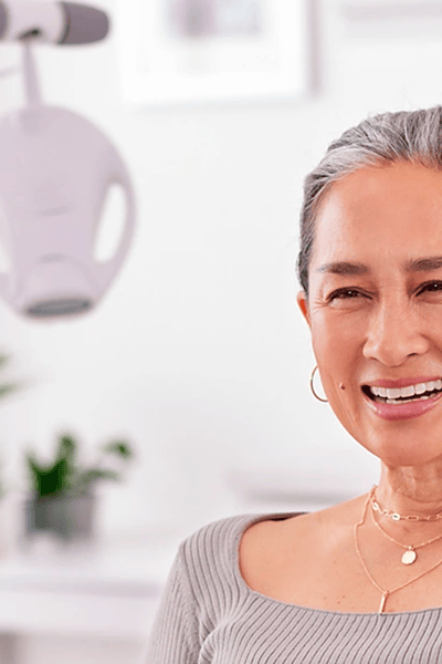 Image of patient with dentist looking in mirror