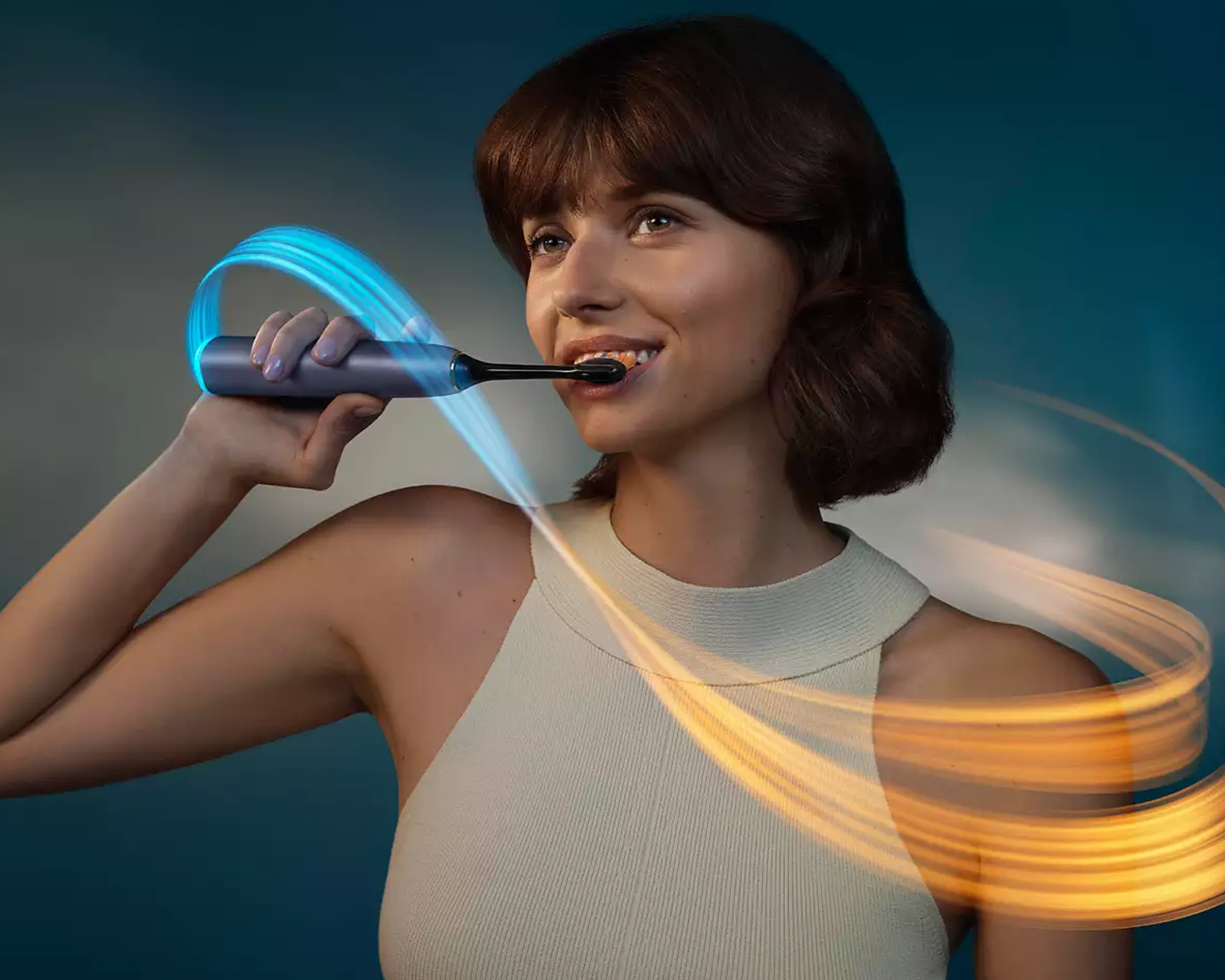 A patient brushing with the power toothbrush.