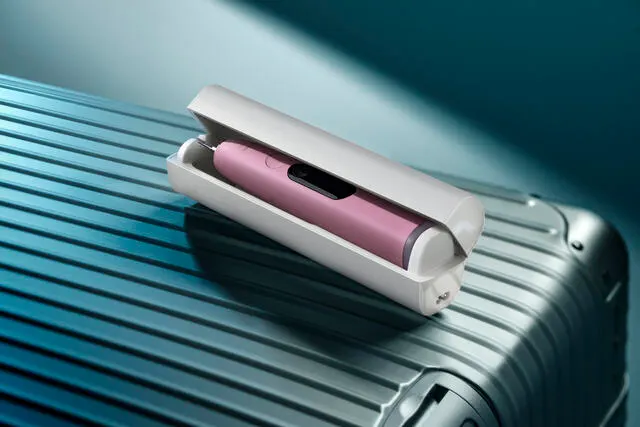 A Philips Next-Generation DiamondClean electric toothbrush in a travel case.