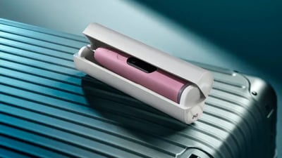 A Philips Next-Generation DiamondClean electric toothbrush in a travel case.