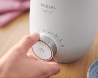 Close-up of Philips Avent bottle warmer in use