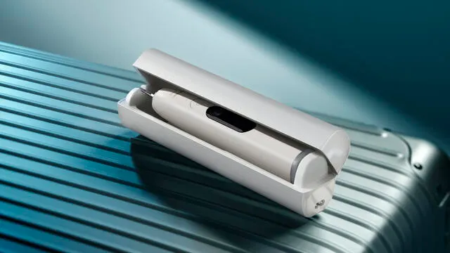 A Philips Next-Generation DiamondClean electric toothbrush in a travel case.