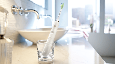 Electric toothbrush detail in modern bathroom