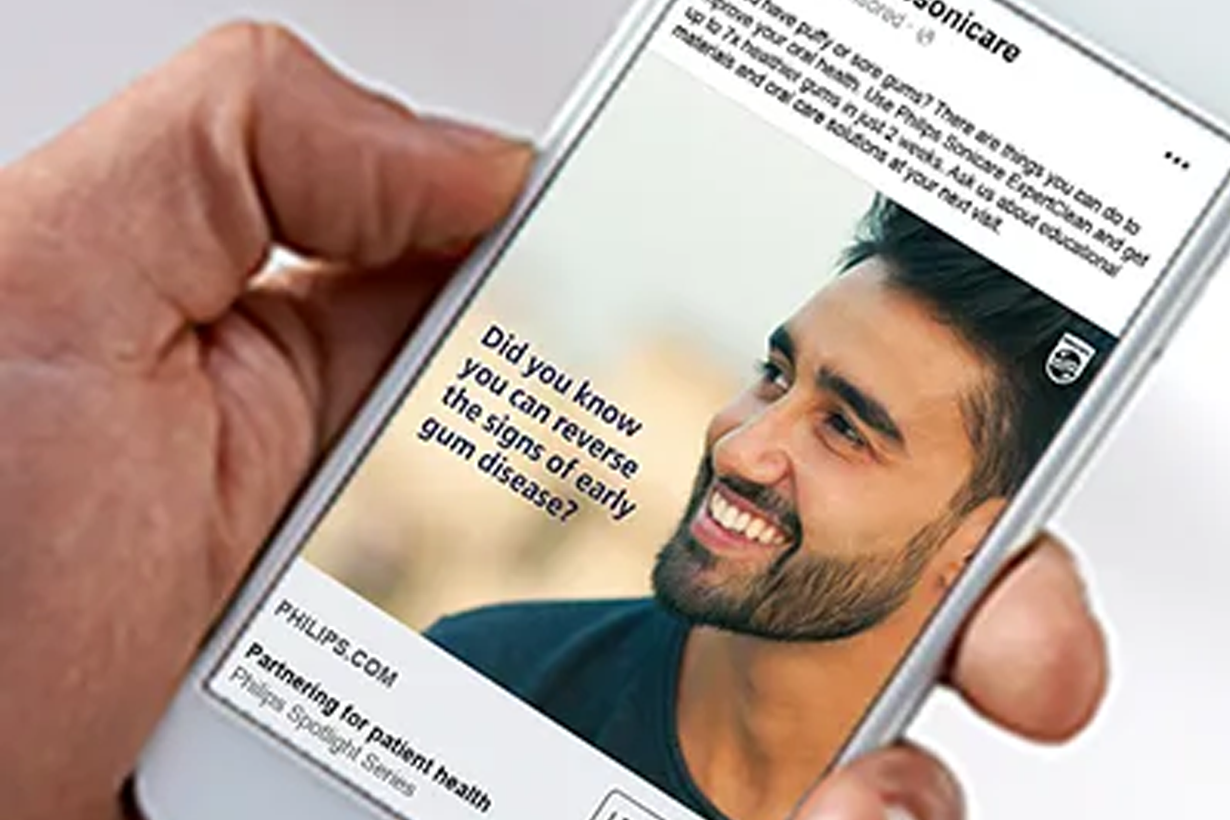 Image of patient with mobile phone.