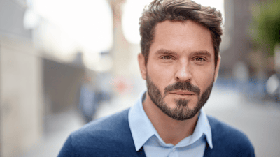 man standing in outdoor with beard and moustache
