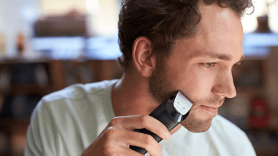 Hombres con recortadora de barba Philips