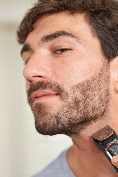Man shaving his beard