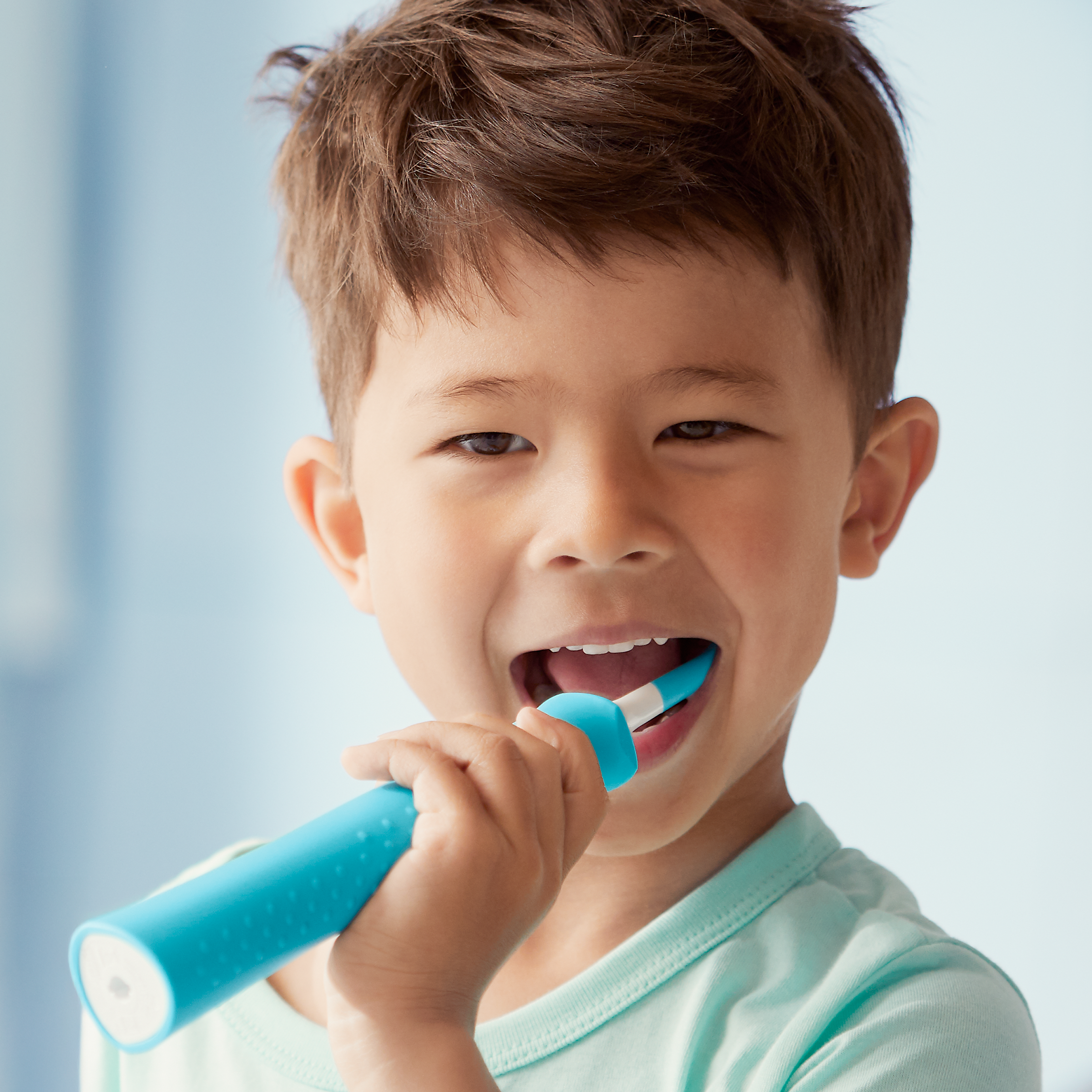 Image of child brushing teeth