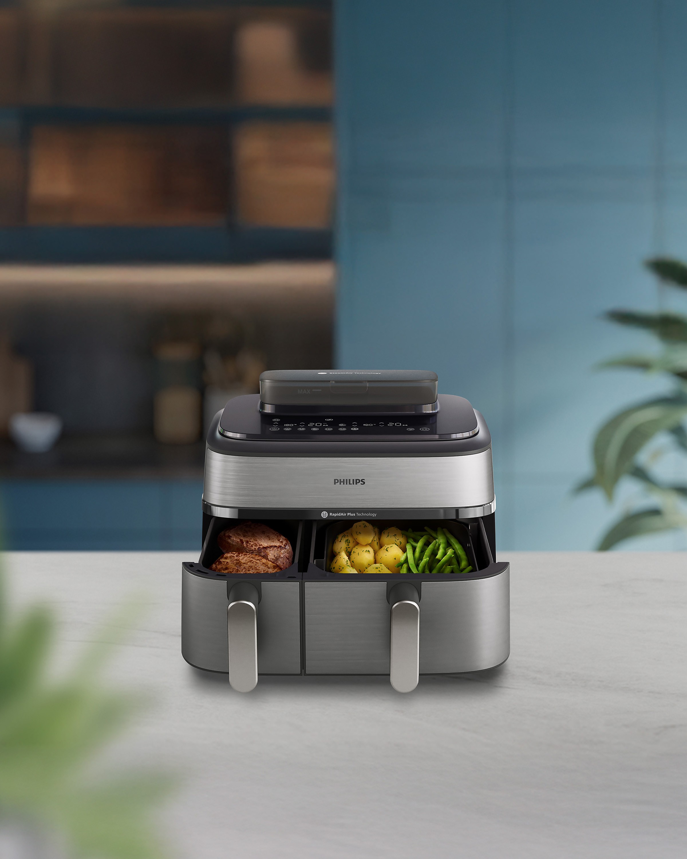 Philips Airfryer ar diviem groziem un tvaicēšanas funkciju