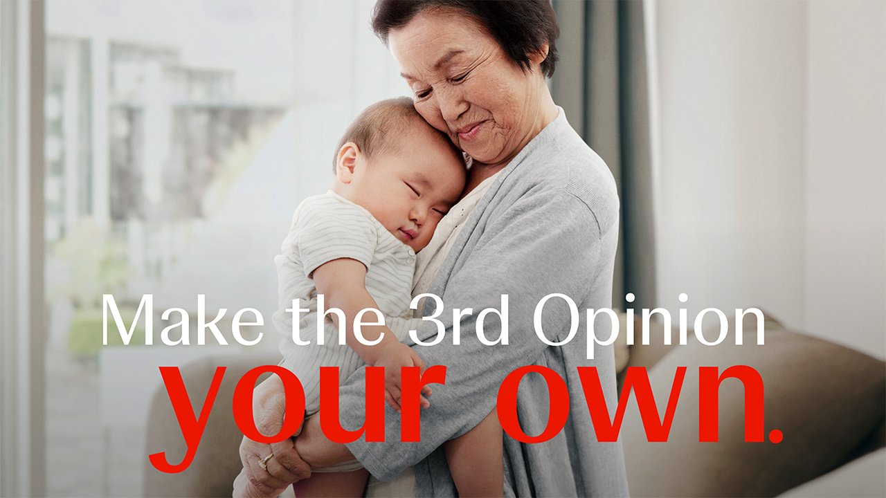 A woman tenderly holds a sleeping baby against her chest in a close portrait photograph. Text reads: Make the 3rd Opinion your own. The image is warm and intimate, used to introduce the lung cancer patient empowerment campaign section.