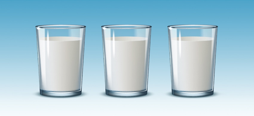 three glasses of milk on blue background