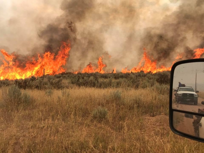 Wildfires in nine western states burn nearly 1.5m acres
