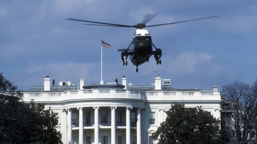 helicopter taking flight in front of U.S. White House