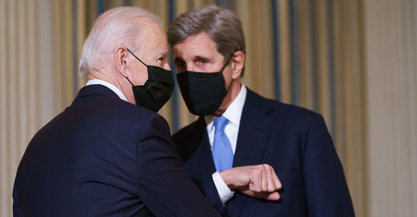 President Biden greets John Kerry, special presidential envoy for climate.