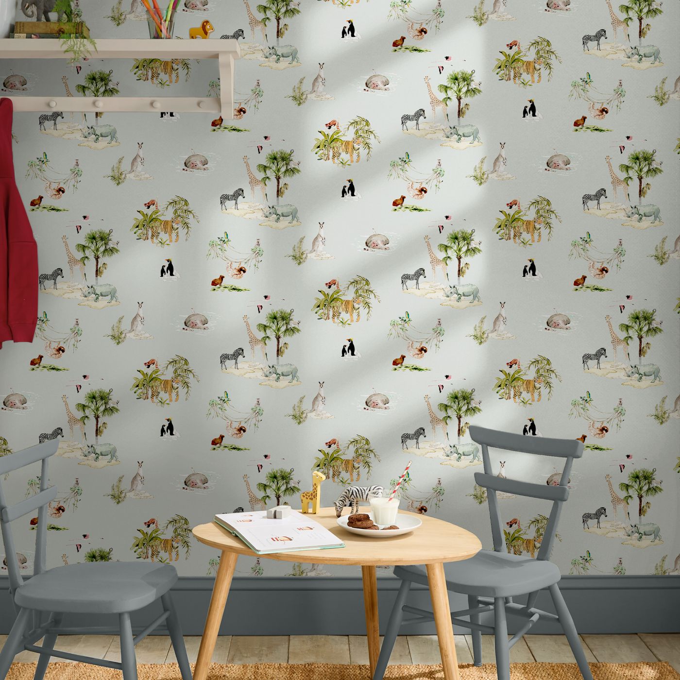 Sophie Allport Animals of the World Misty Blue Wallpaper with a shelf and a child size table and chairs