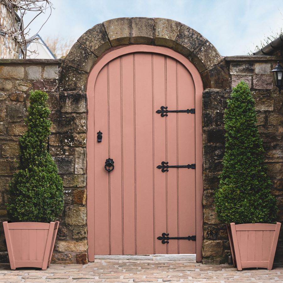 Outdoor image of garden gate featuring Aloha exterior paint