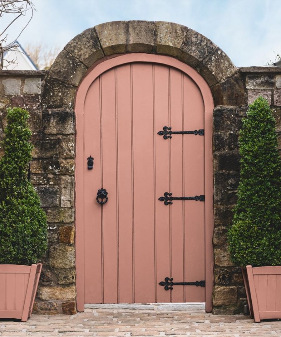 Outdoor image of garden gate featuring Aloha exterior paint