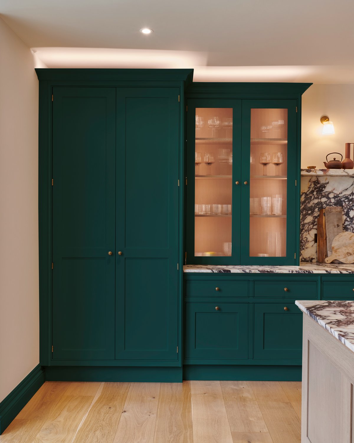 Petrol paint on kitchen cabinets