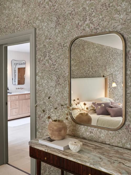 Roomset with sideboard and mirror featuring Reverie whispering rose wallpaper
