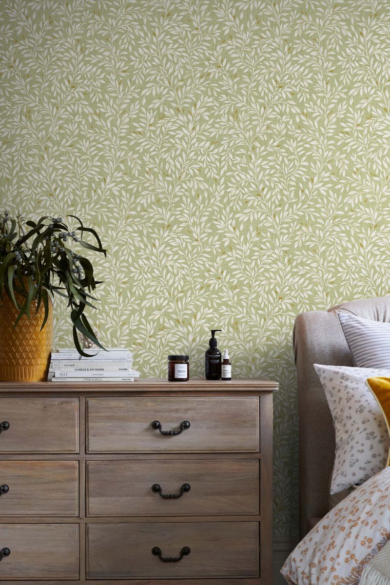Next Ditsy Leaf Green Wallpaper in a Living Room