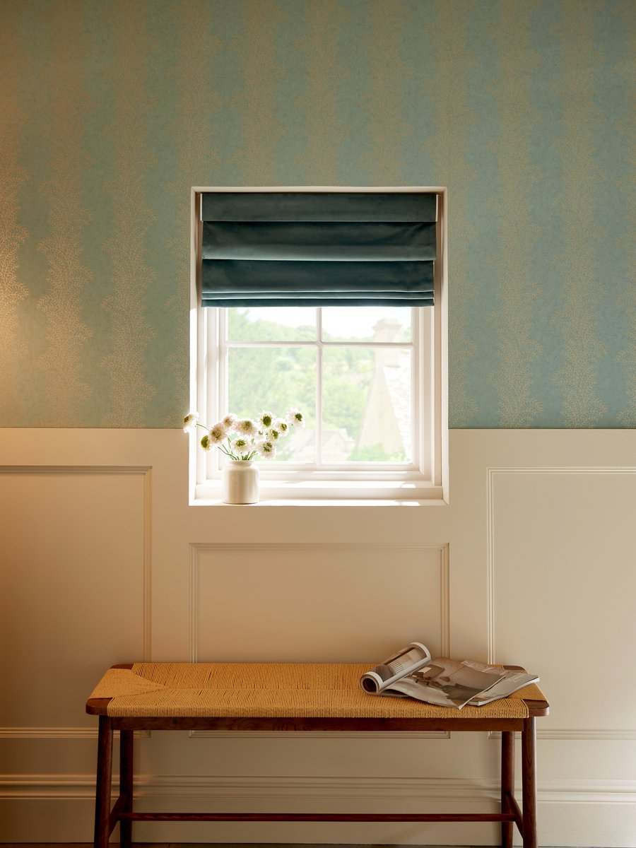 Opulence Spearmint roman shade in a hallway area