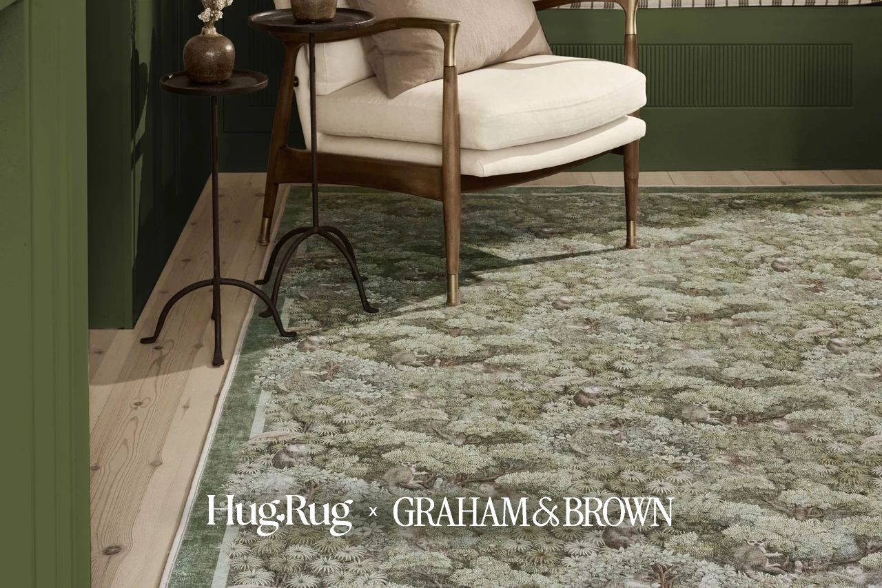 Treetop Troop Green rug in a living room setting coordinated with Forest paint and Treetop Troop Green Wallpaper on the walls
