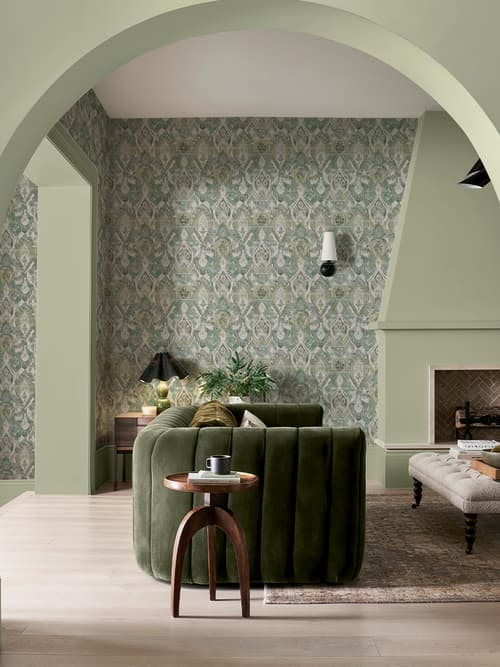 Daraee Tapestry Green wallpaper with Whirl paint in a living room setting