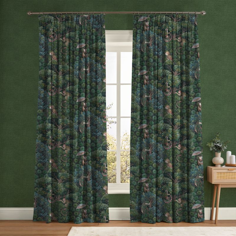 A window dressed with Treetop Troop Green Curtains, with the walls finished in Haptic Green Wallpaper