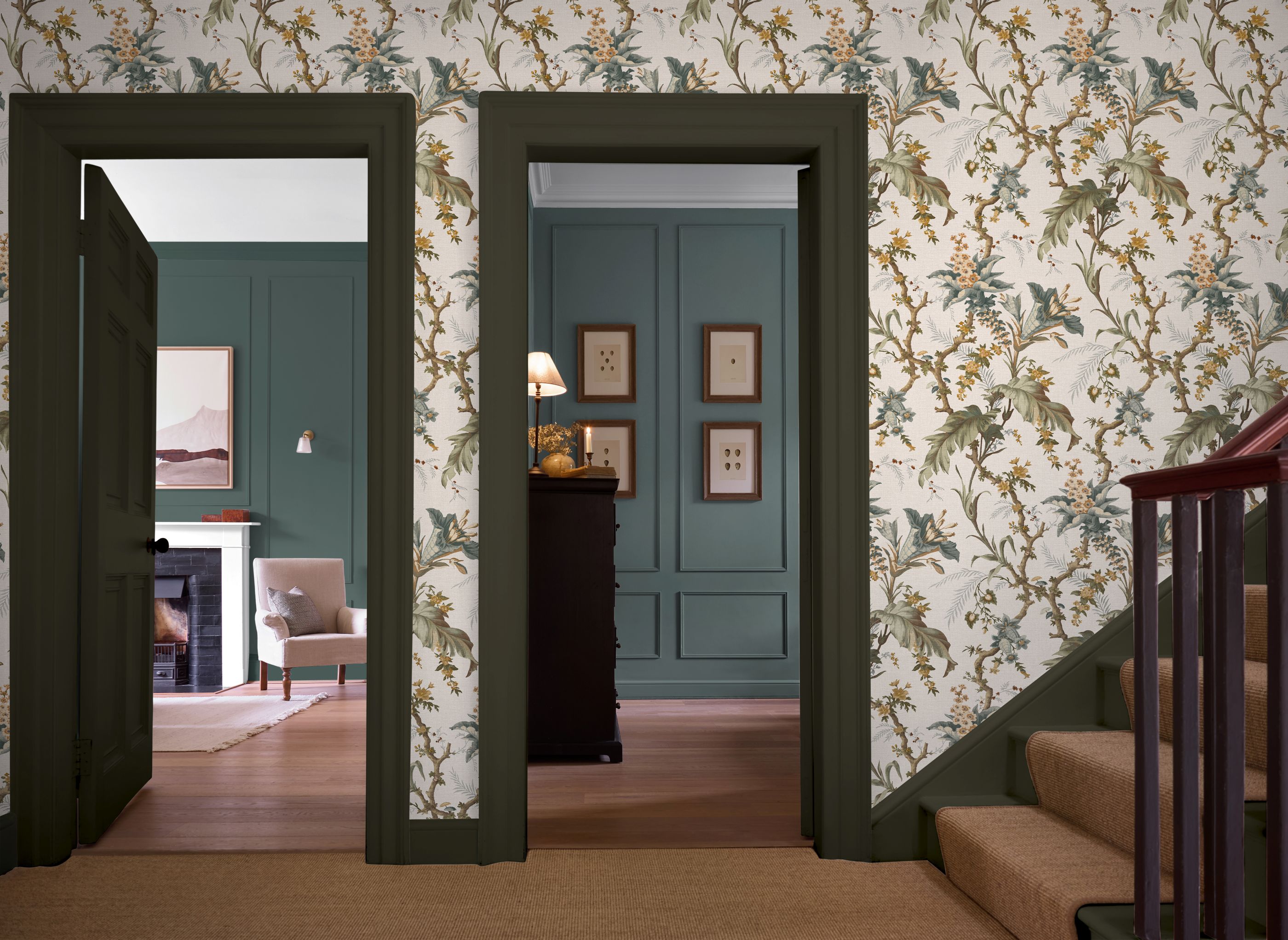 Arbour Press Celeste Wallpaper in a hallways setting partnered with Cotswold Moss Paint on the trims