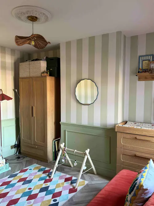 children's room with cupboards and quartet stripe wallpaper