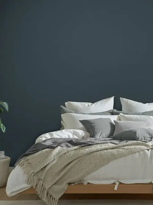 image on bedroom featuring bed and boyfriend jeans paint