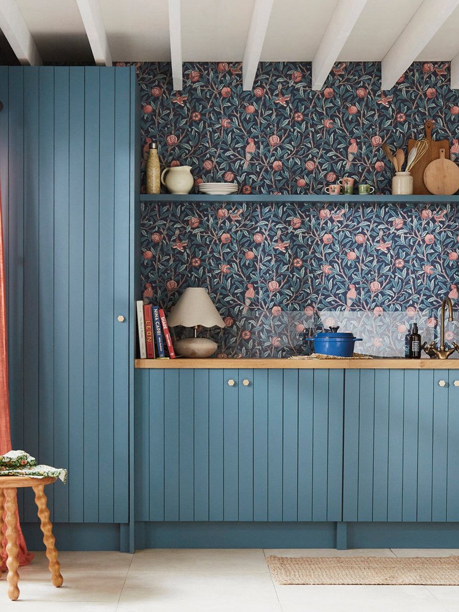 William Morris At Home Bird & Pomegranate Navy Blue Wallpaper in a kitchen