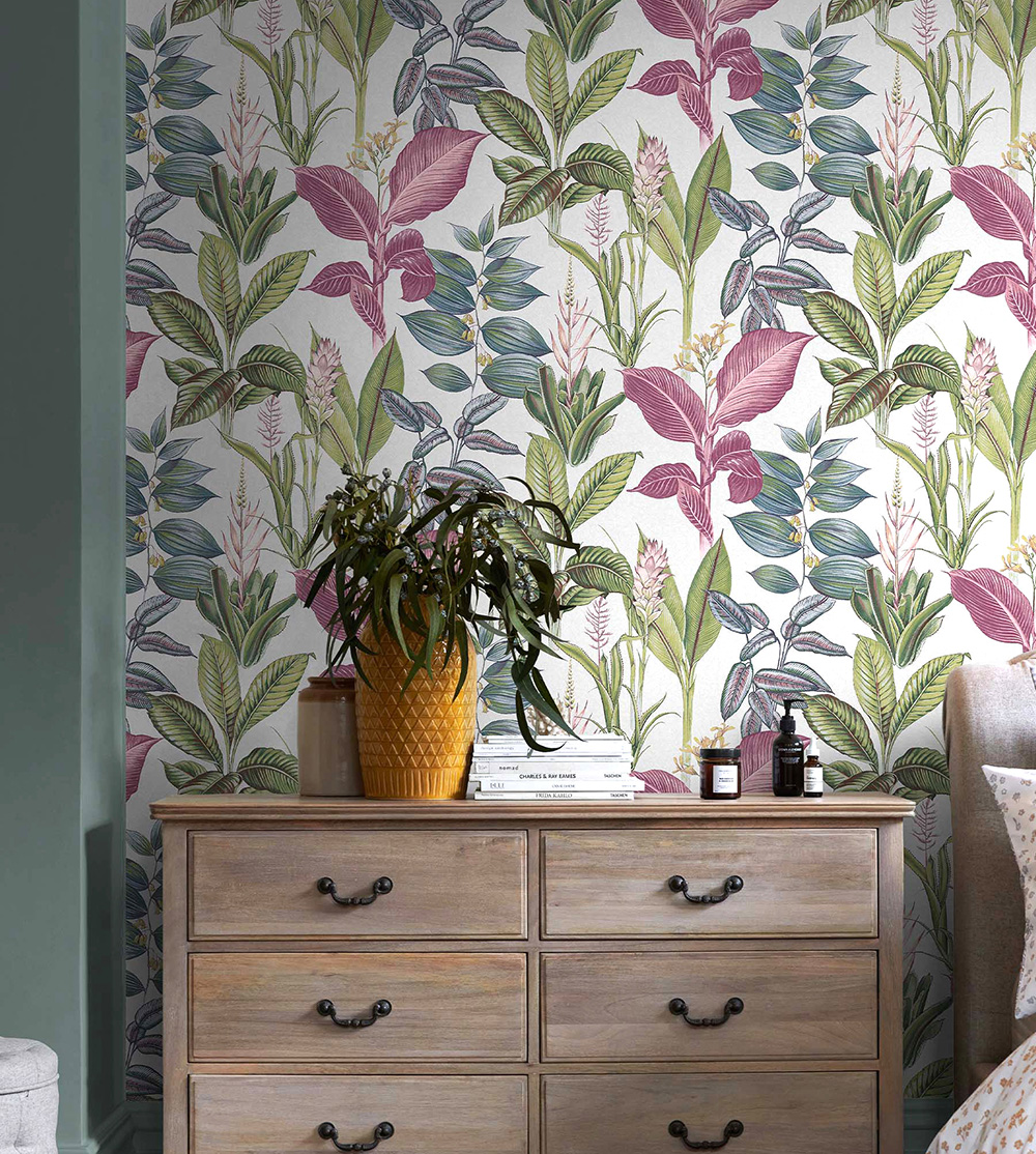 Next Fantasy Rainforest Leaves Wallpaper in a bedroom with chest of drawers