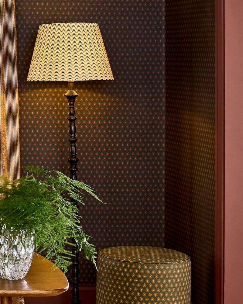 Dobby Petrol Wallpaper with Chilli Cocoa interior eggshell on the woodwork and Ridge Loom Sienna adorning the window with Dobby Pouffee in a cosy nook area