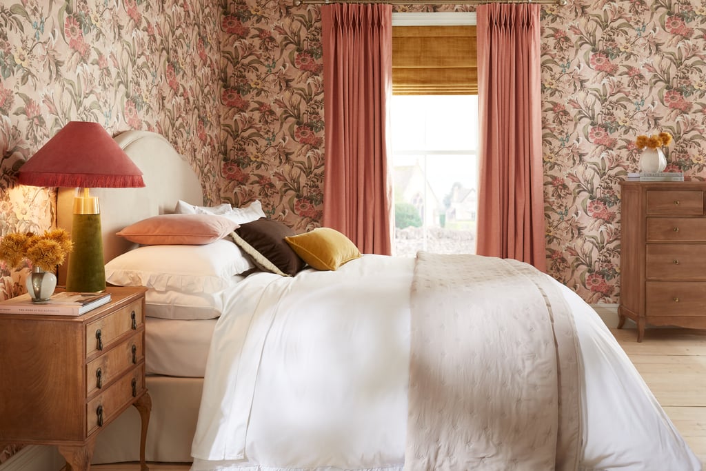 Lys Whispering Rose wallpaper with perfectly partnered paint, curtains and roman blind in a bedroom set