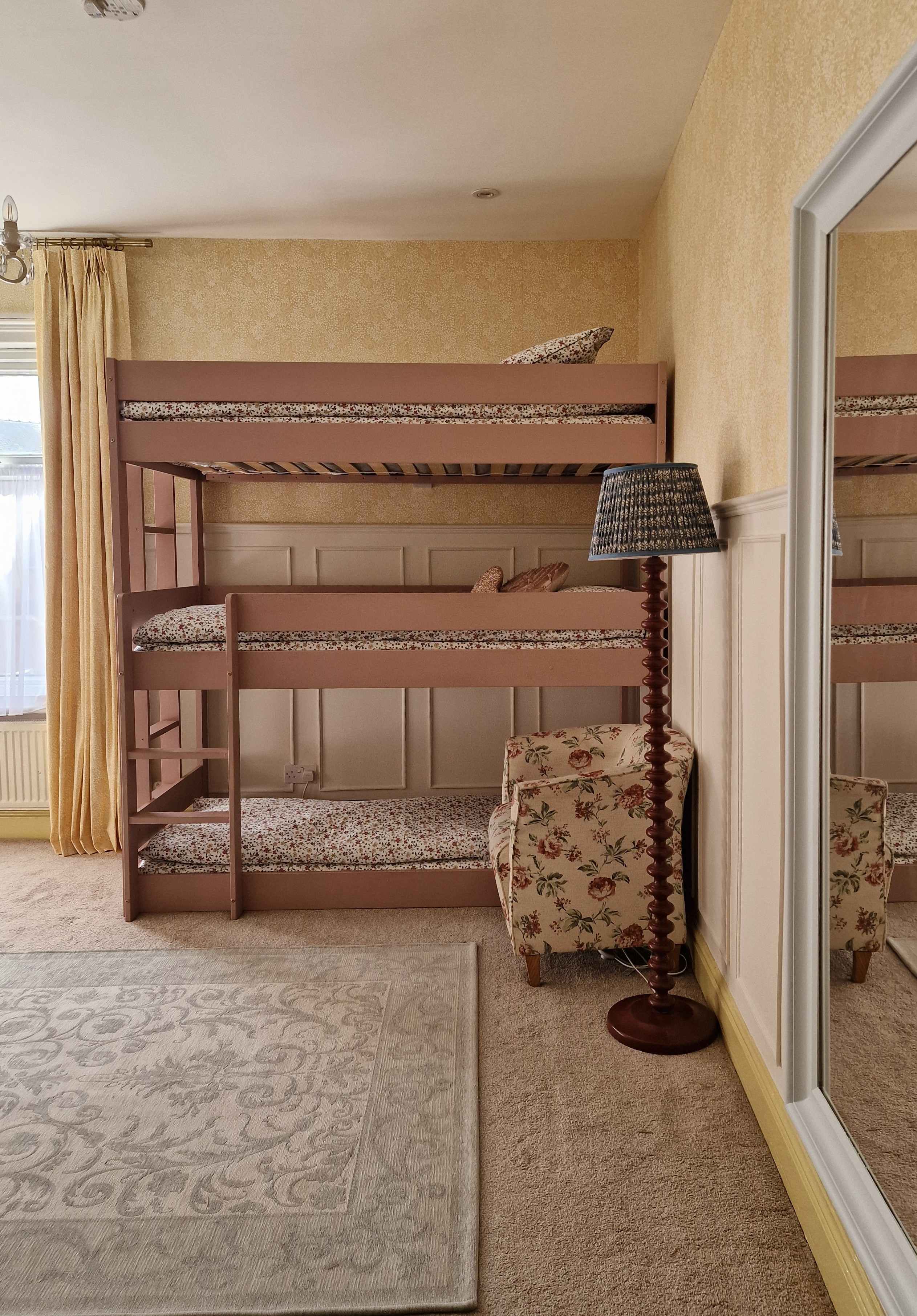 image of bunk beds with daisyfield wallpaper and creme brulee paint