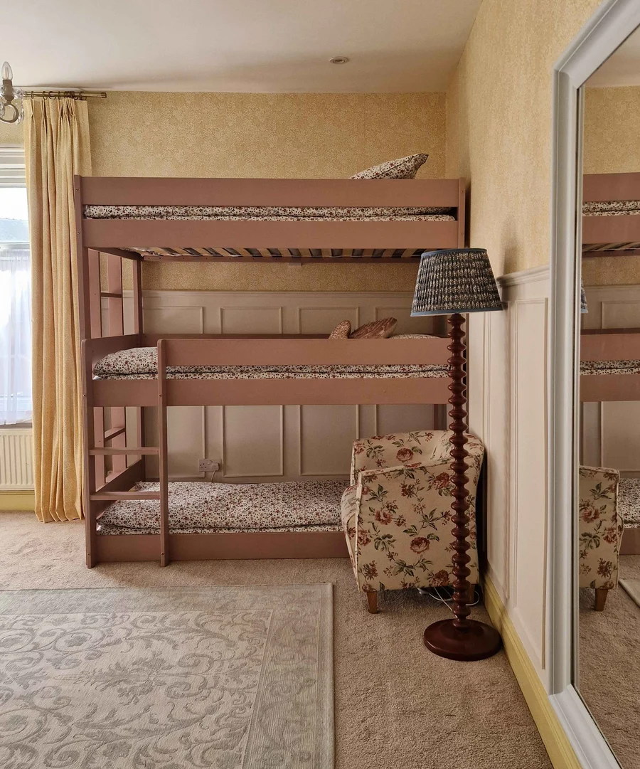 image of bunk beds with daisyfield wallpaper and creme brulee paint