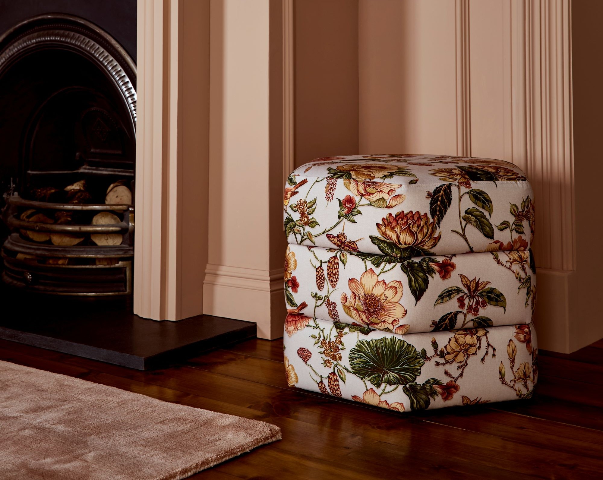 Roselle Grove Dusky Pink Pouffe in a living room setting